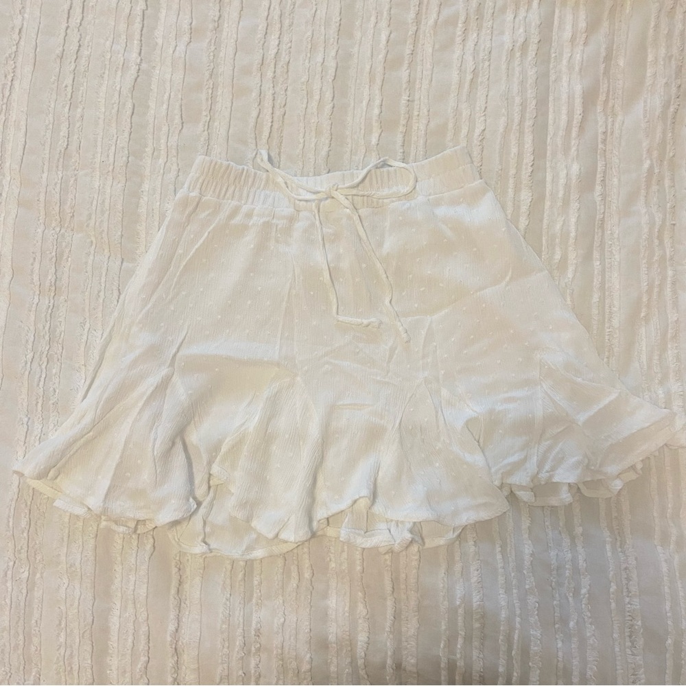 white dotted mini skirt
